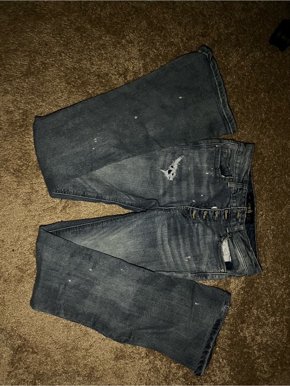 Indigo Rein Boot Cut Jeans in Dark Blue with Distressed Detail